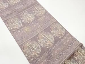 横段に古代人物・花唐草模様織出し袋帯